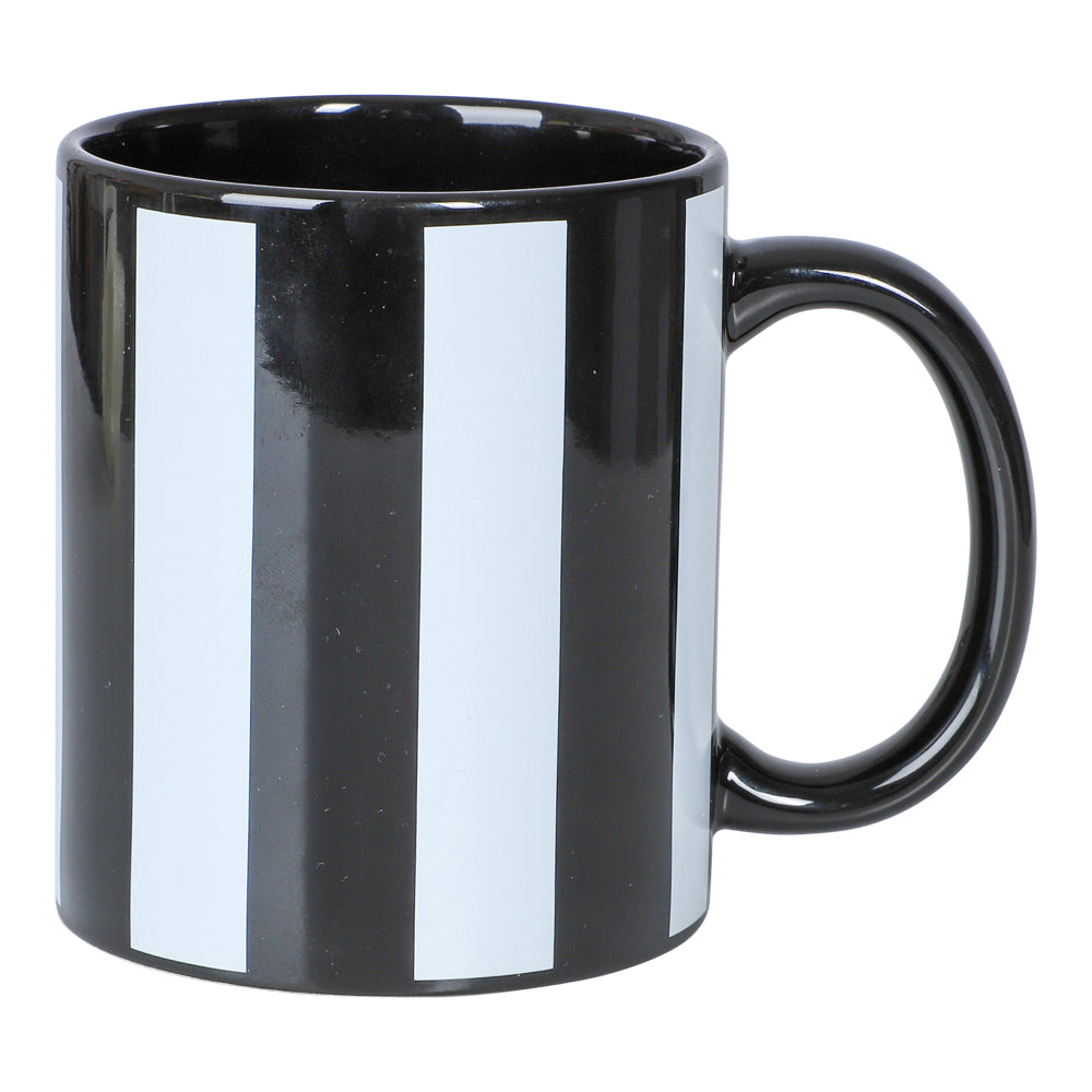 Newcastle United-mugg i fin presentask
